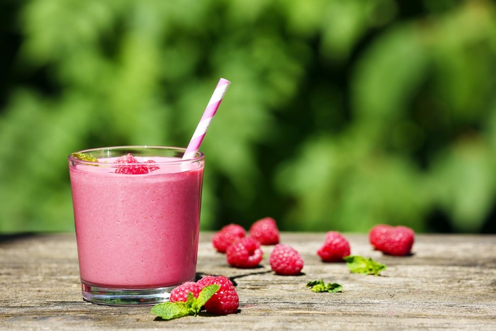 Raspberry Smoothie in Highball Glass with Raspberries