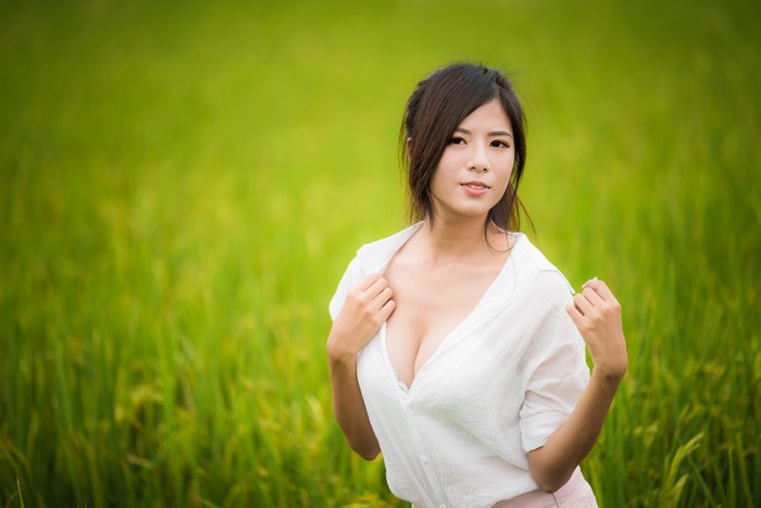 4K Portrait of Asian Woman in White Blouse