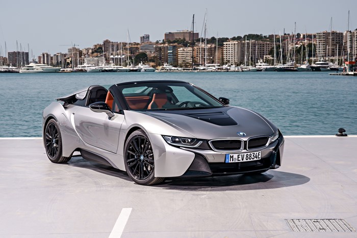 Silver BMW i8 Roadster by the water