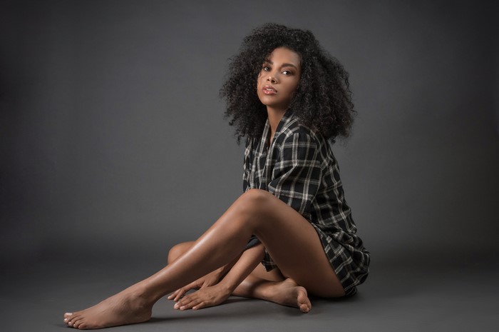 Daniela Sitting in Plaid Formal Shirt