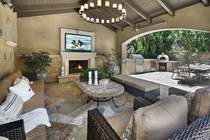 Outdoor Living Room with Fireplace and Kitchen