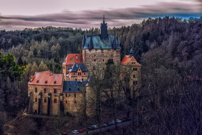 Kriebstein Castle in Germany surrounded by forests
