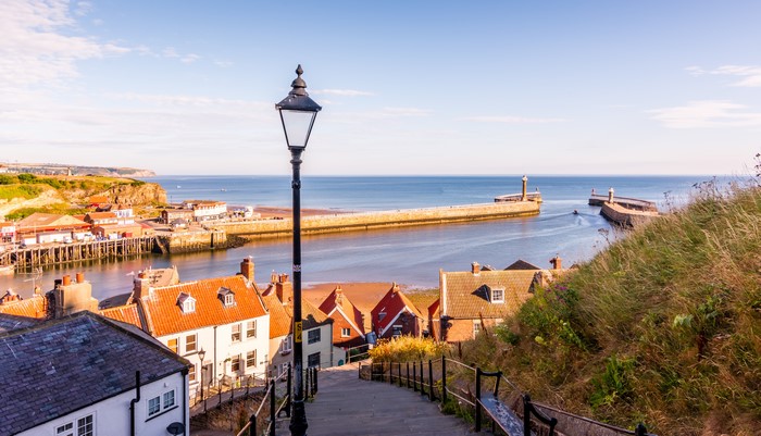 Whitby, Yorkshire, England with harbor and stairs