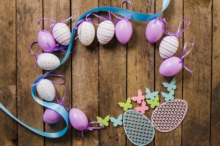 Easter Eggs and Butterflies on Wood Planks