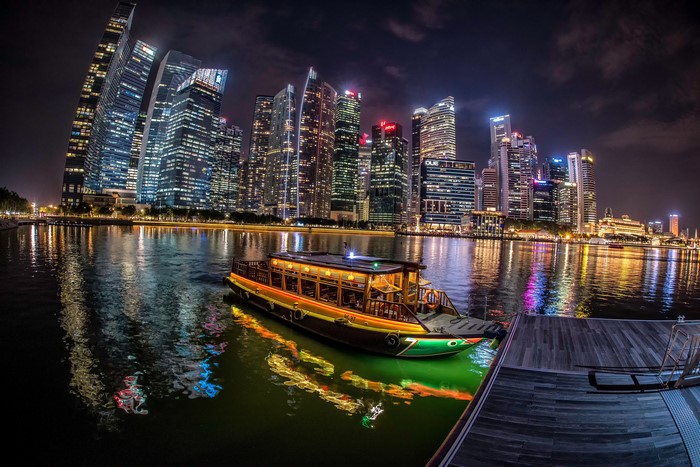 Singapore Riverboat at Night with Skyscrapers