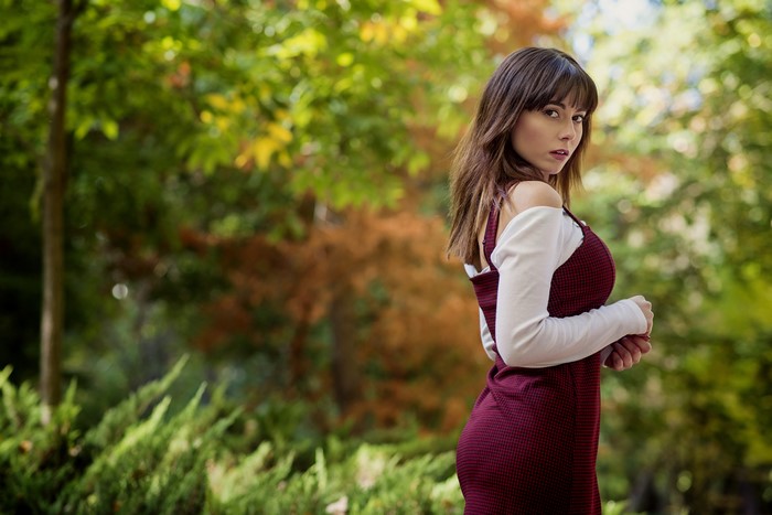 Woman in Dress Looking Over Shoulder