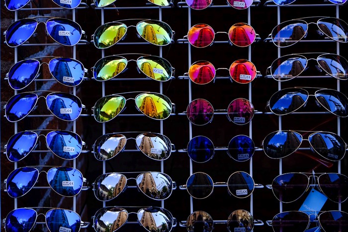 Many sunglasses with reflections