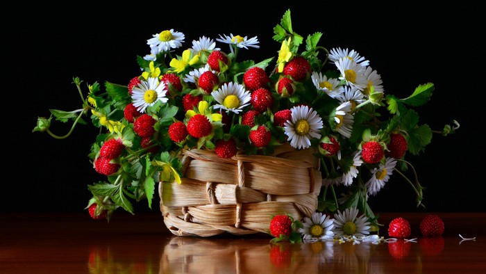 Wild Strawberries and Daisies in a Wicker Basket