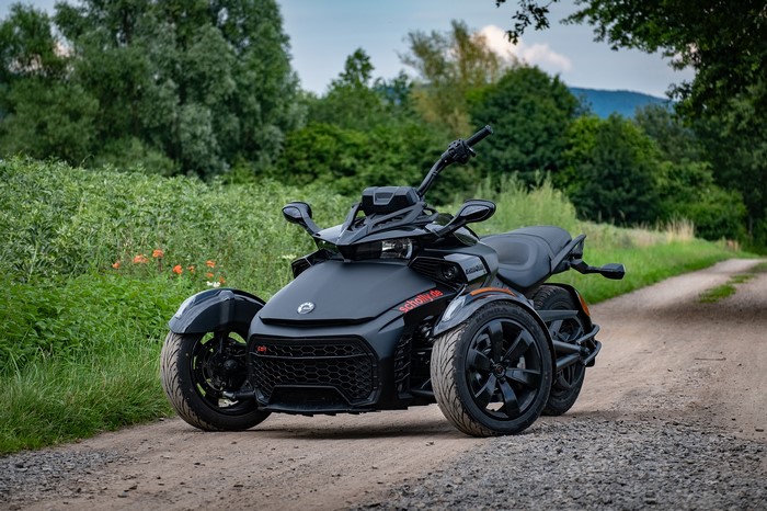 Black Can-Am Spyder F3-S Trike on a Dirt Road