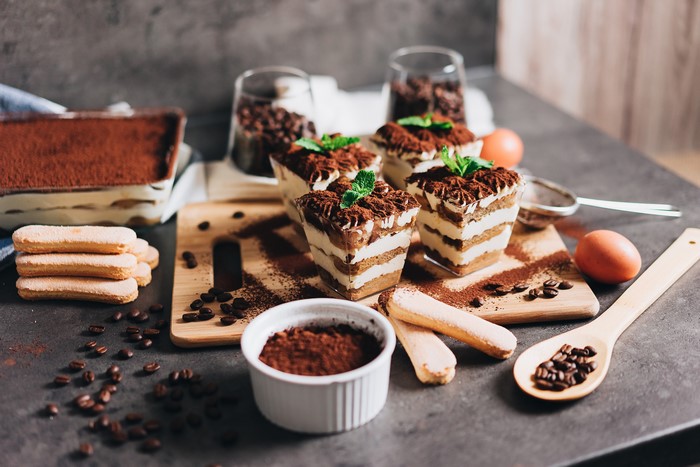Tiramisu desserts with coffee beans and ladyfingers