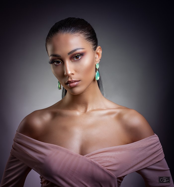 Woman with makeup and earrings