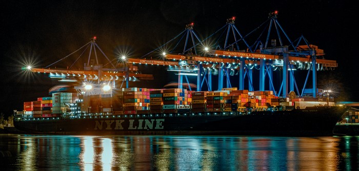 Container ship NYK Line at Container Terminal Altenwerder at night