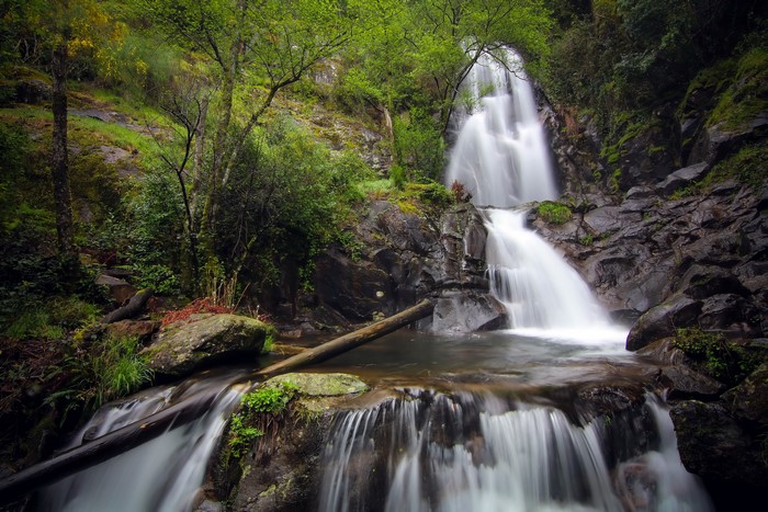 Waterfall in Coimbra, Portugal with Trees and Stones
