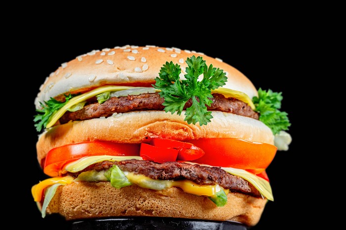 4K Hamburger with Vegetables on Black Background