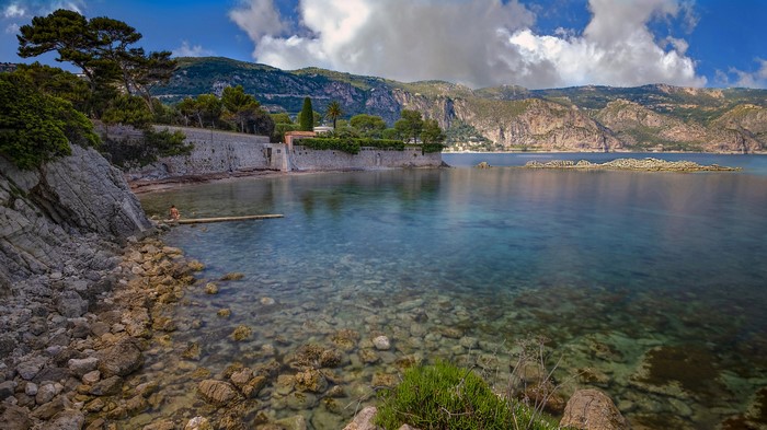 Person on dock in Saint Jean Cap Ferrat bay, France