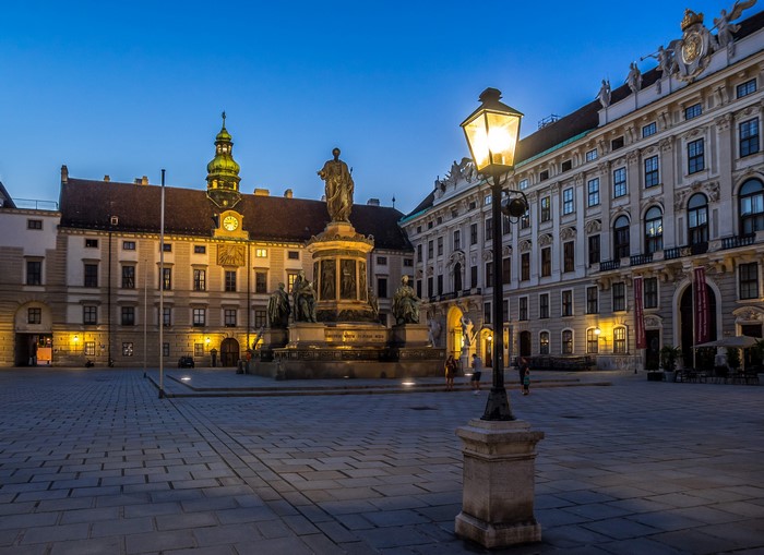 Monument and buildings in Vienna at dusk