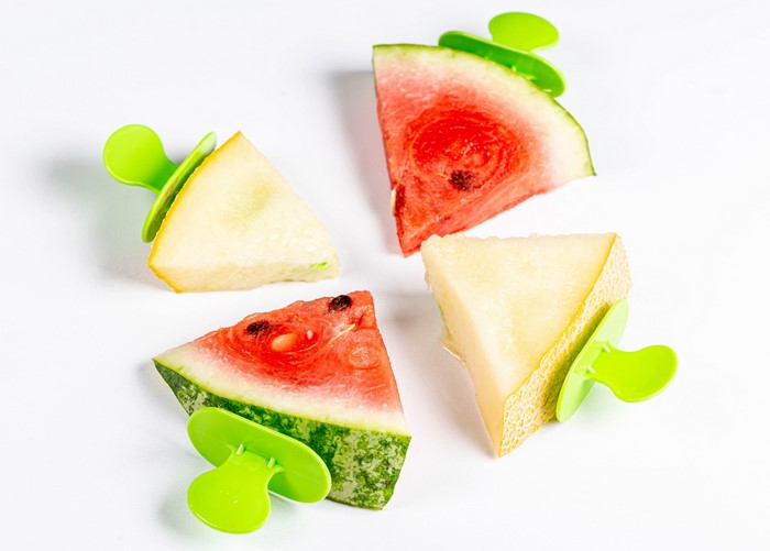 Fruit popsicles made from watermelon and melon slices