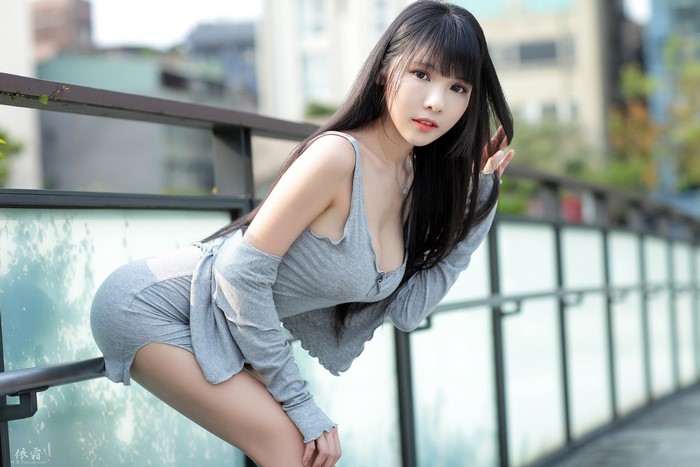 Asian Brunette Girl in Gray Dress Pose