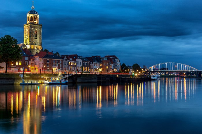 Deventer, Netherlands at Dusk with River and Bridge
