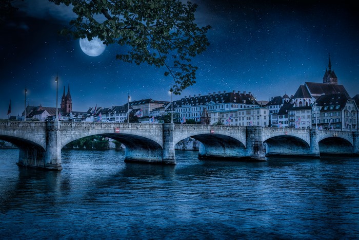 Basel, Switzerland at Night with Moon and Bridge