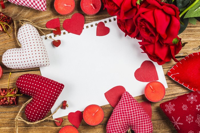 Valentine's Day Roses, Candles, and Hearts on Wood