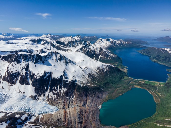 Snow-capped mountains and fjords in Norway