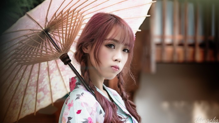 4K Japanese girl with umbrella and braids