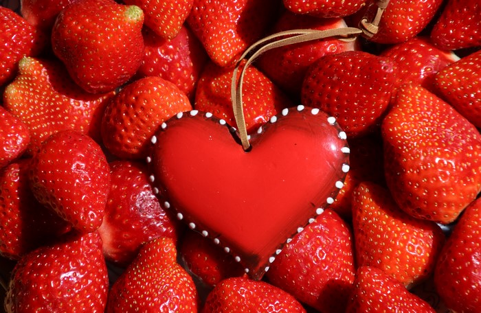 Strawberries and a red heart decoration