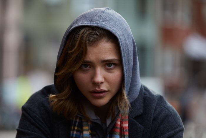Chloe Grace Moretz wearing a hood