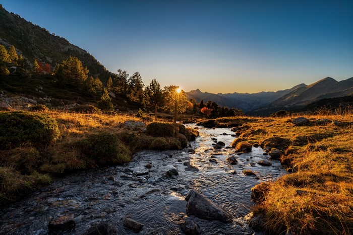 Sunrise over a mountain stream in the Pyrenees