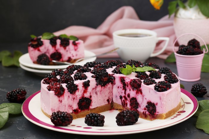 Blackberry Cheesecake with a slice and coffee