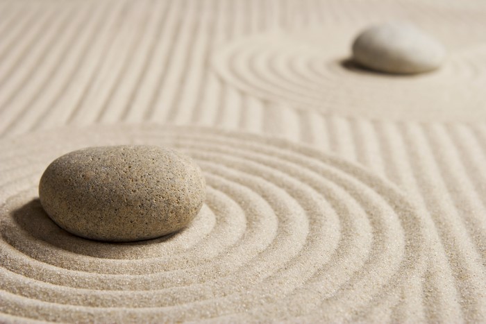 Zen garden with raked sand and stones
