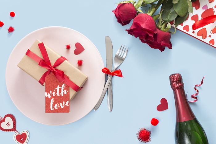 Valentine's Day Dinner Setting with Roses and Champagne