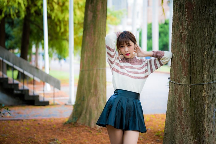 4K Asian Woman in Sweater and Skirt