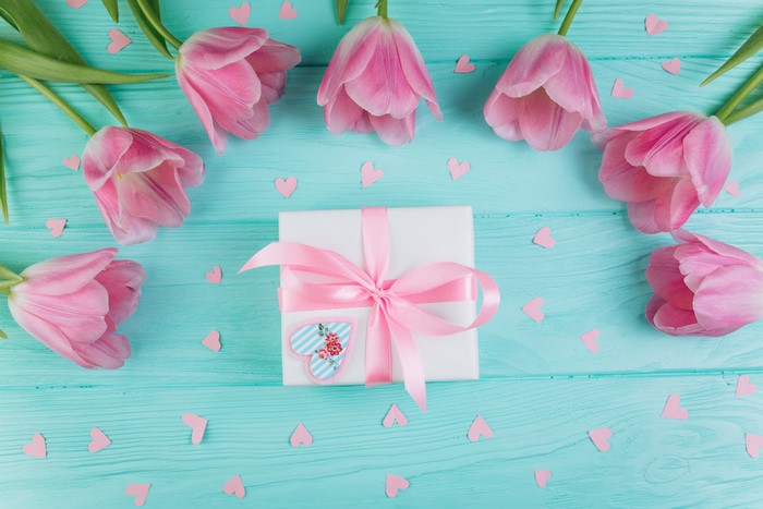 Pink Tulips and Gift Box on Wood Planks