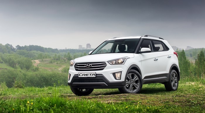 White Hyundai Creta 2016 Crossover on Grass
