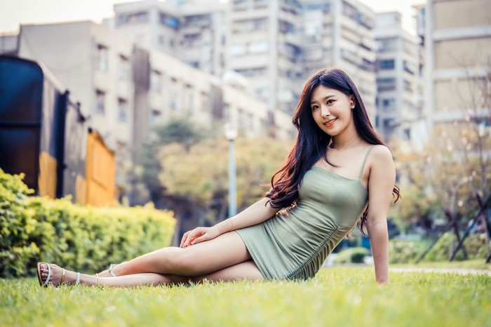 4K Asian Woman Sitting in Green Dress