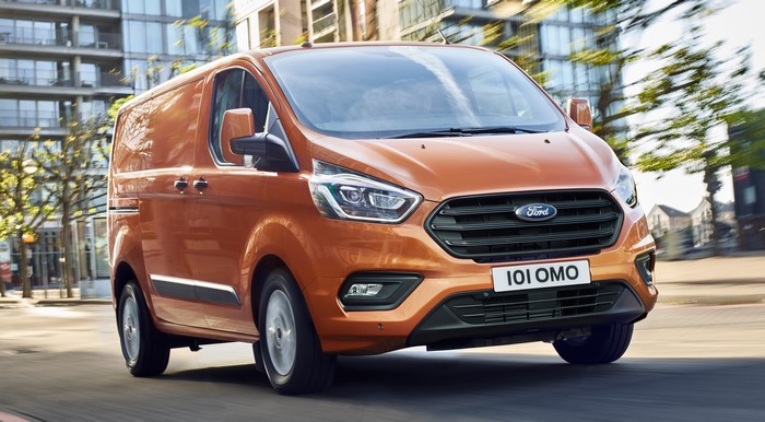 Orange Ford Transit Custom Van