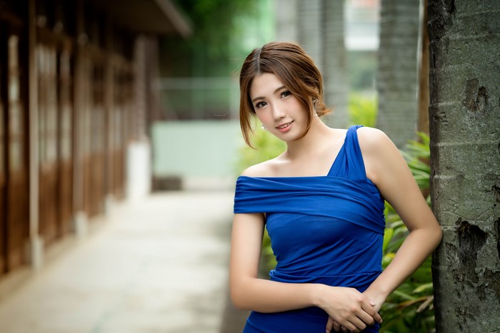 Beautiful Asian woman in blue dress