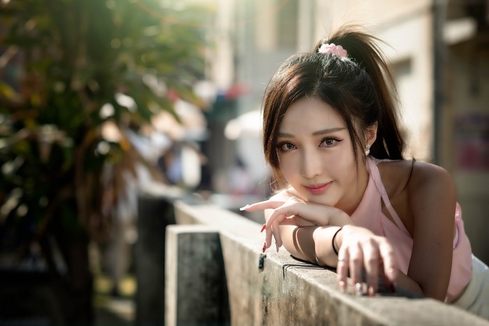 4K Asian Woman with Brown Hair and Bokeh Effect