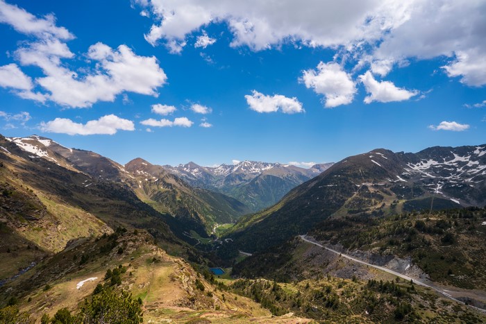 Mountain Valley with Road and Clouds in Andorra