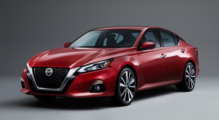 Red Nissan Altima Platinum Sedan