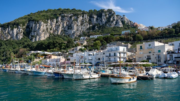 Marina Grande, Capri, Italy with boats and mountains