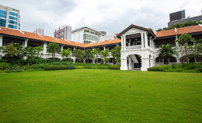 Raffles Hotel Singapore lawn and building