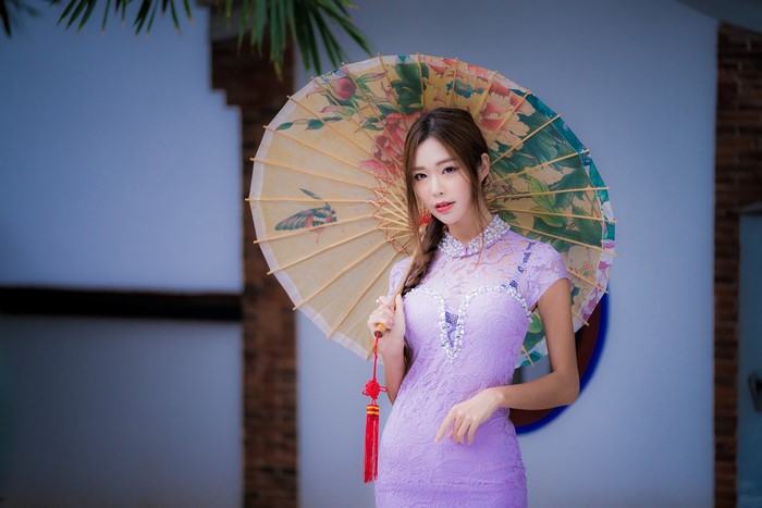 4K Portrait of Asian Woman with Umbrella