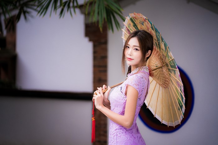 4K Asian Woman with Traditional Umbrella