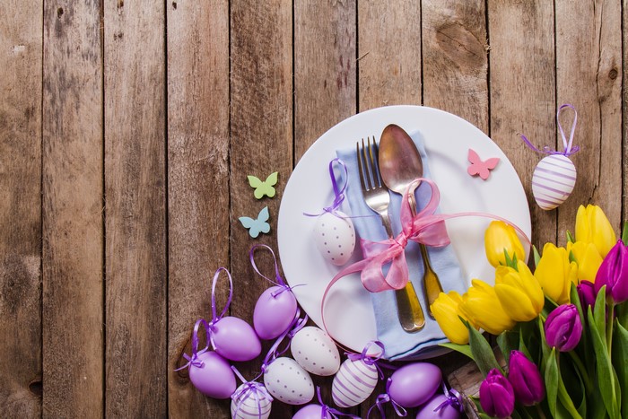 Easter table setting with tulips and eggs