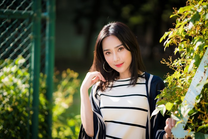 Asian Brunette Girl with Hoop Earrings