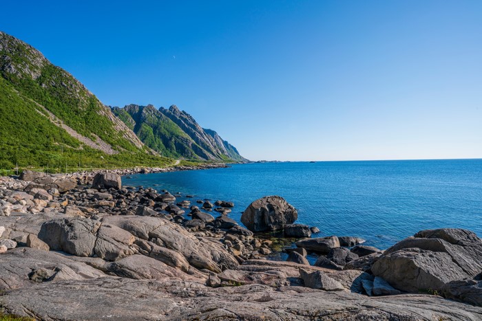 Rocky Coastline in Lofoten, Norway under Clear Blue Sky