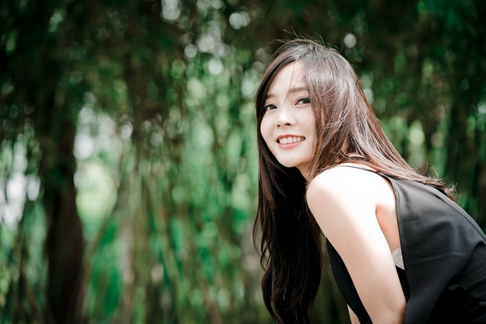 4K Image of Smiling Asian Woman with Bokeh